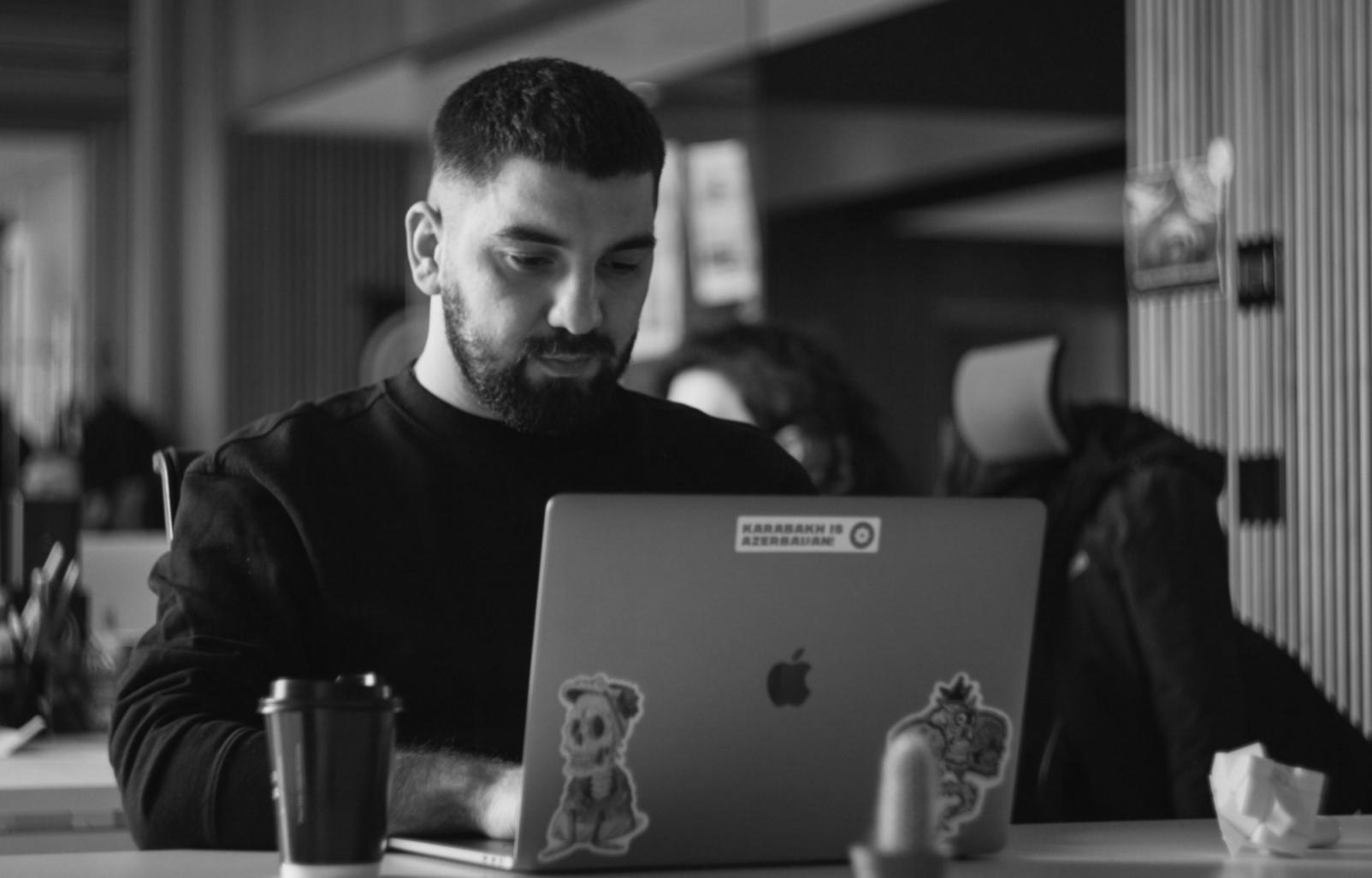 Professional mentor reviewing financial analysis with individual student